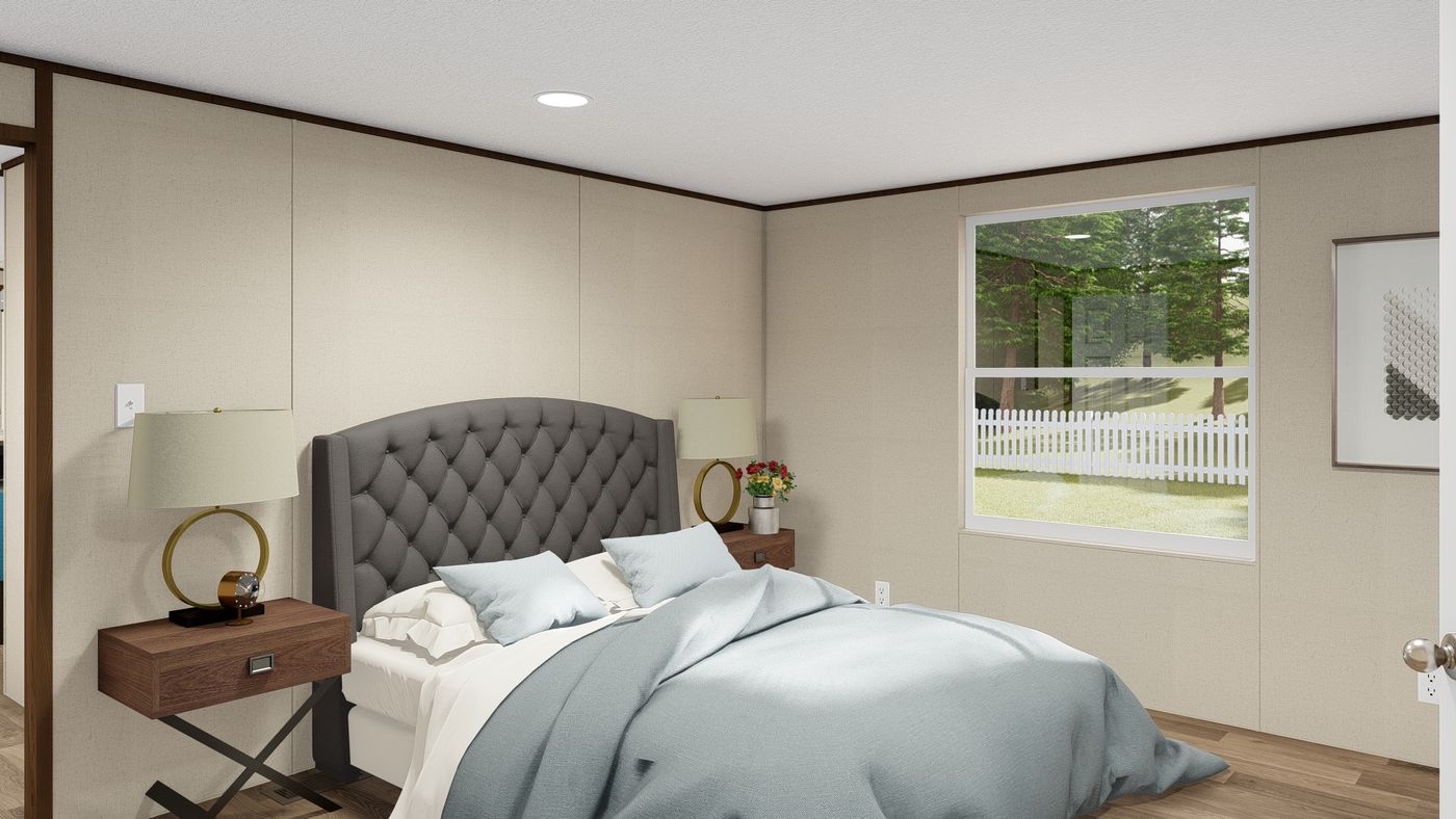 The ELATION Primary Bedroom. This Manufactured Mobile Home features 3 bedrooms and 2 baths.