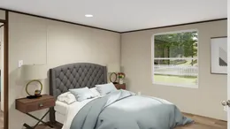 The ELATION Primary Bedroom. This Manufactured Mobile Home features 3 bedrooms and 2 baths.