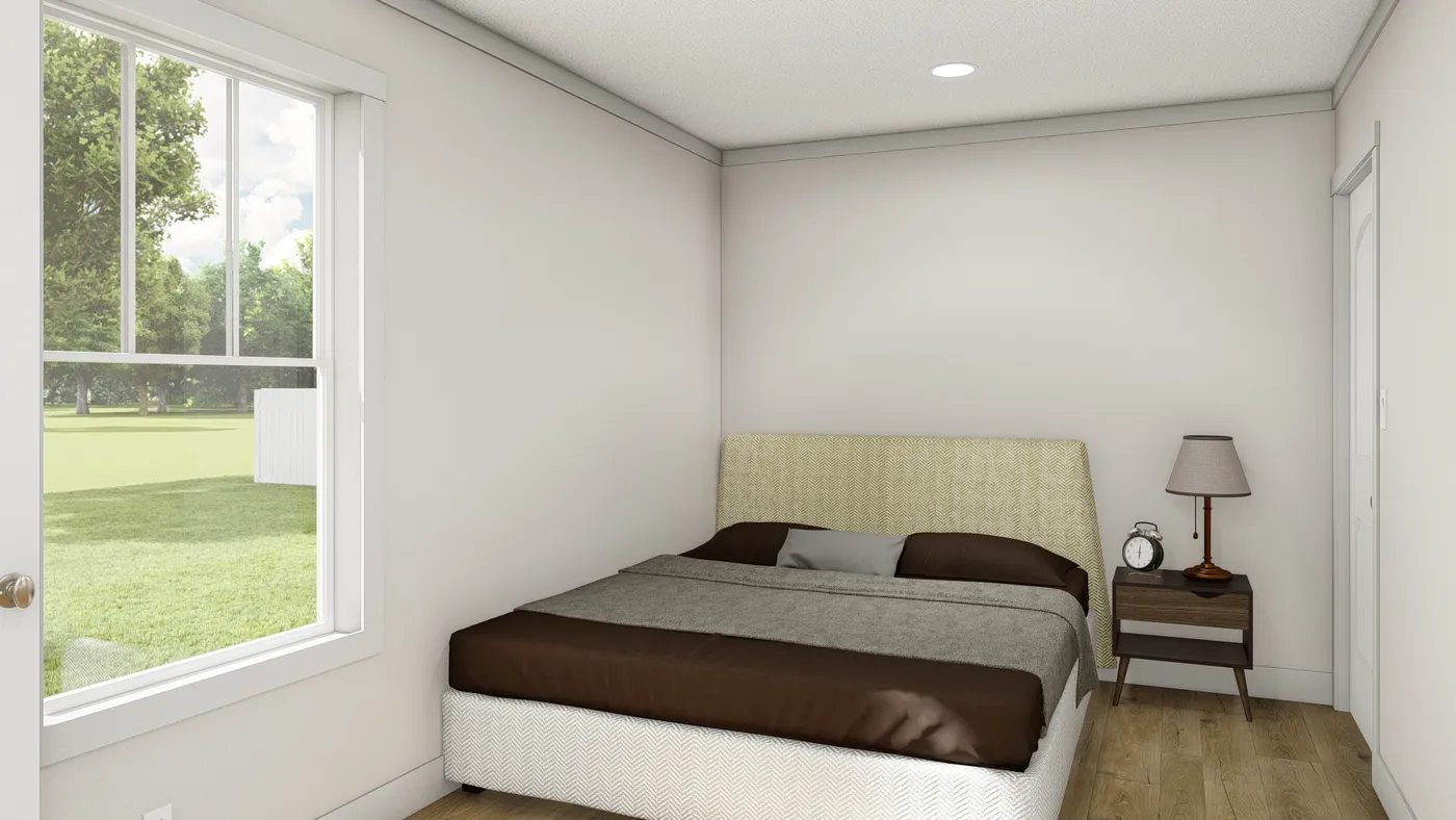 The LAYLA Primary Bedroom. This Manufactured Mobile Home features 2 bedrooms and 1 bath.