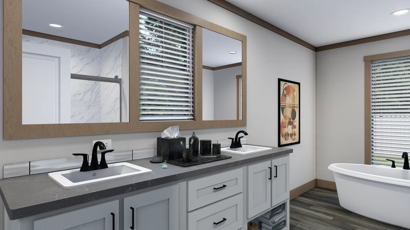 The EVERETT ELITE Primary Bathroom. This Manufactured Mobile Home features 4 bedrooms and 3 baths.