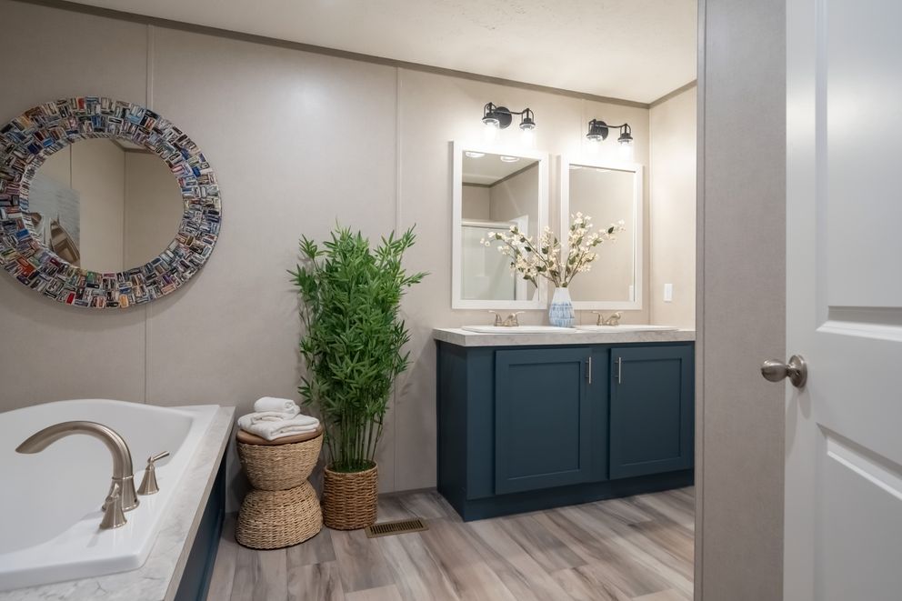 The TRADITION 48F Primary Bathroom. This Manufactured Mobile Home features 3 bedrooms and 2 baths.