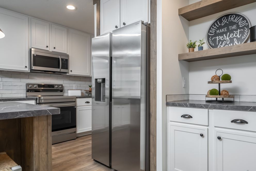 The THE LIZZIE Kitchen. This Manufactured Mobile Home features 3 bedrooms and 2 baths.