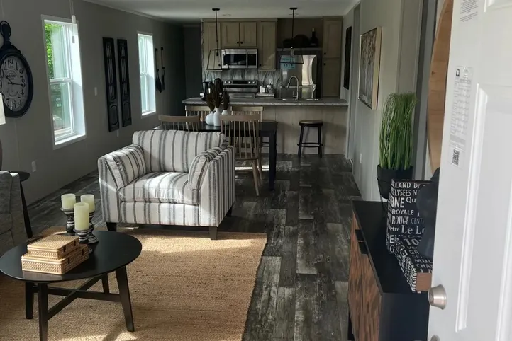 The JADE Living Room. This Manufactured Mobile Home features 2 bedrooms and 1 bath.
