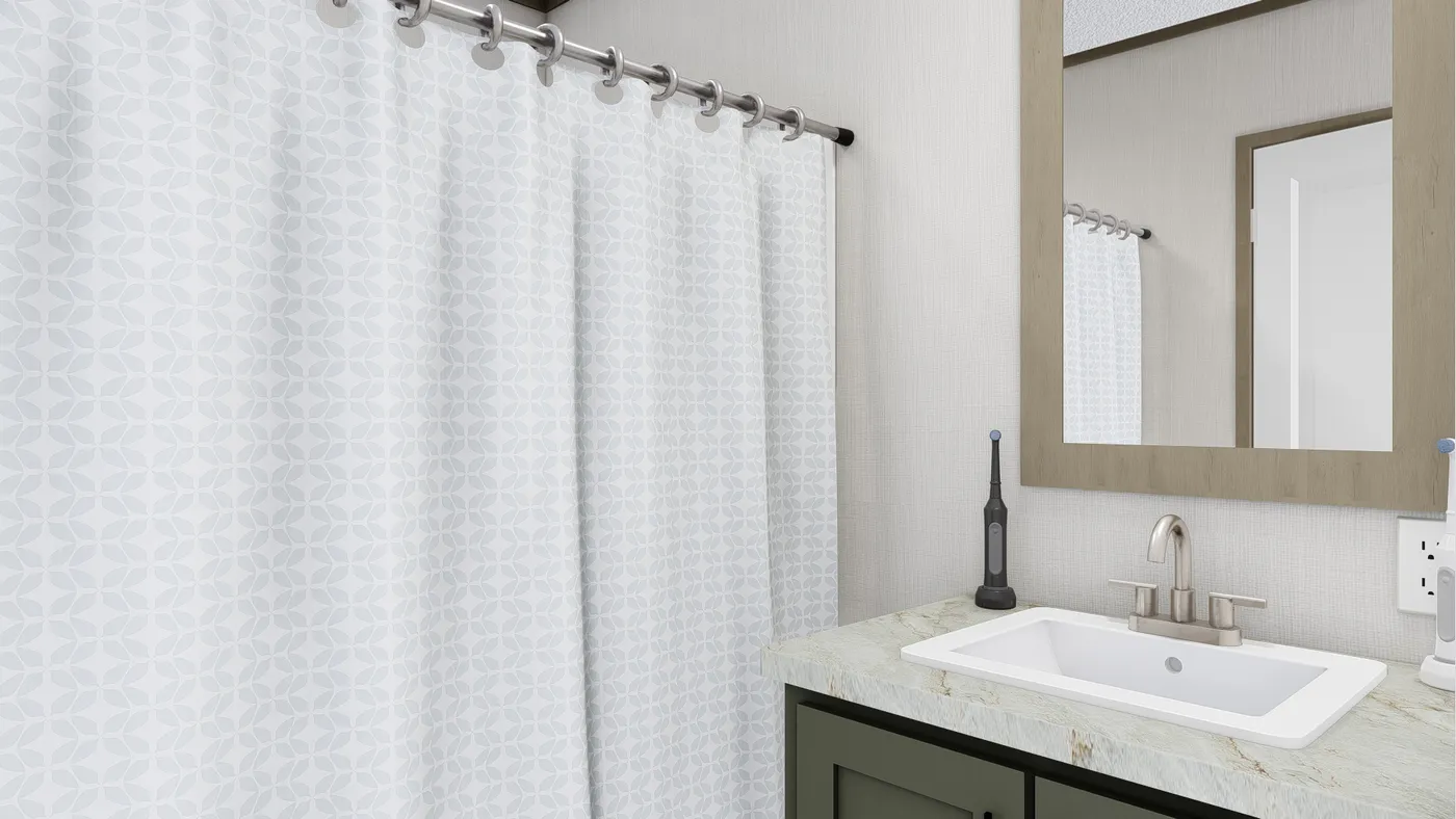 The MAGELLAN Guest Bathroom. This Manufactured Mobile Home features 3 bedrooms and 2 baths.