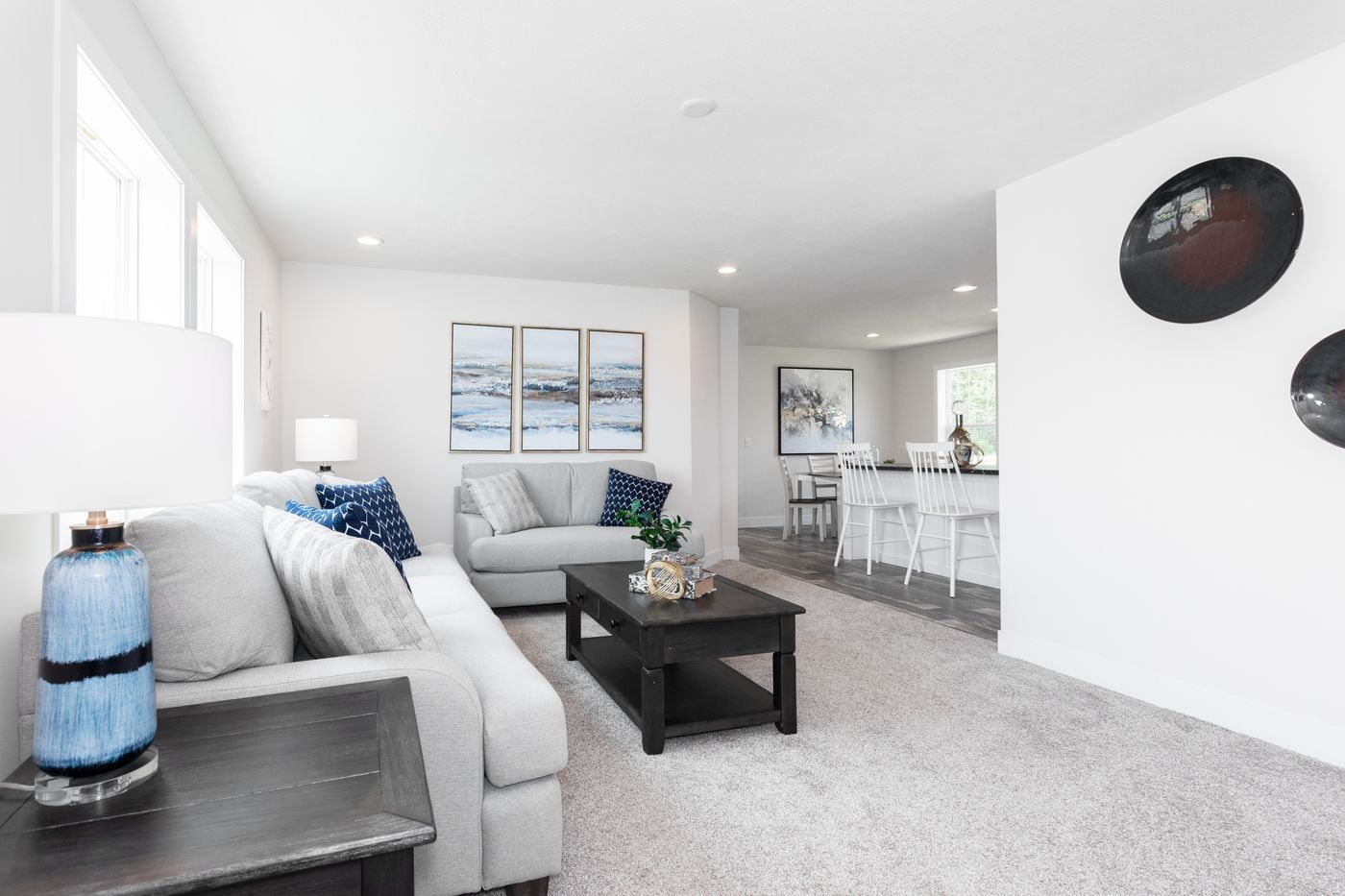 The ECLIPSE/6028-MS063 Living Room. This Manufactured Mobile Home features 3 bedrooms and 2 baths.