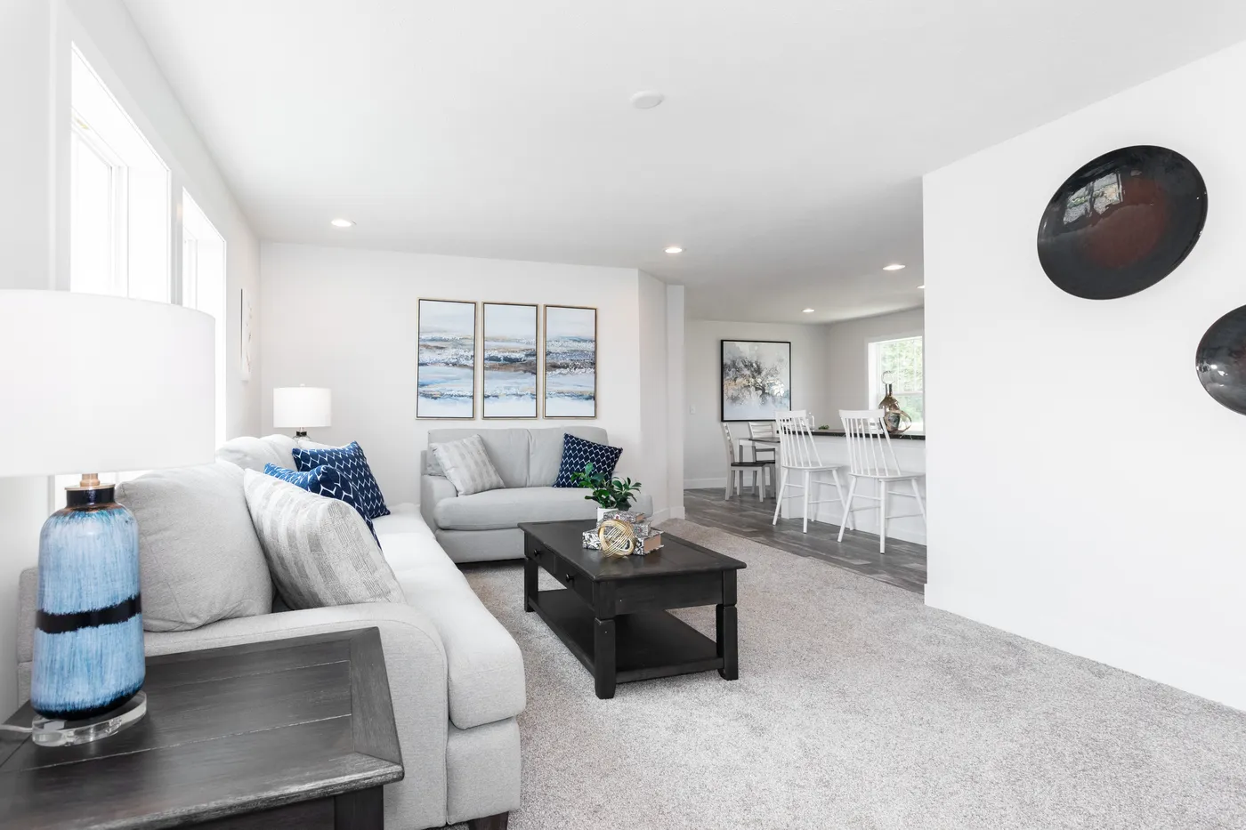 The ECLIPSE/6028-MS063 Living Room. This Manufactured Mobile Home features 3 bedrooms and 2 baths.