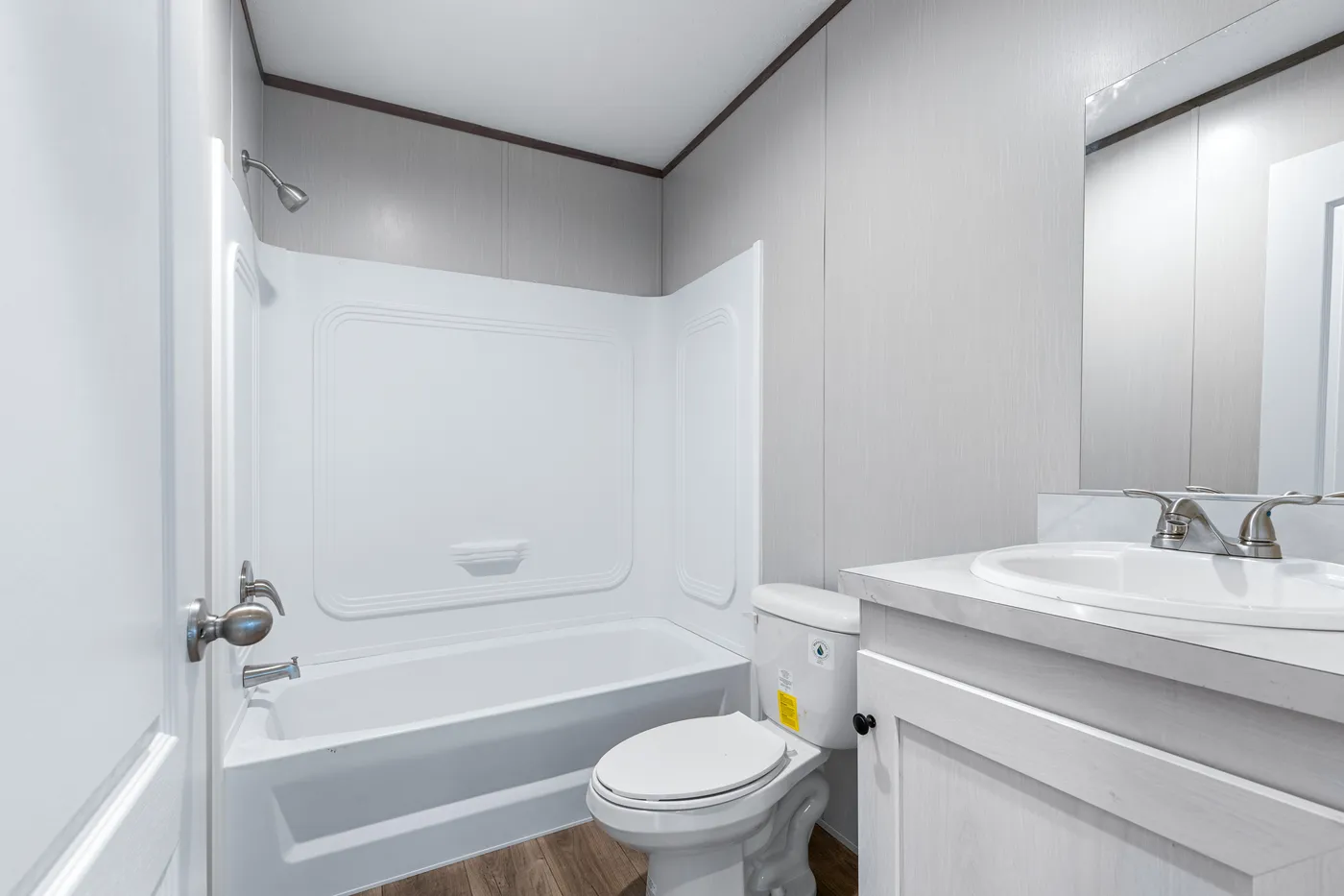 The HOMESTEAD 16602A Guest Bathroom. This Manufactured Mobile Home features 2 bedrooms and 2 baths.