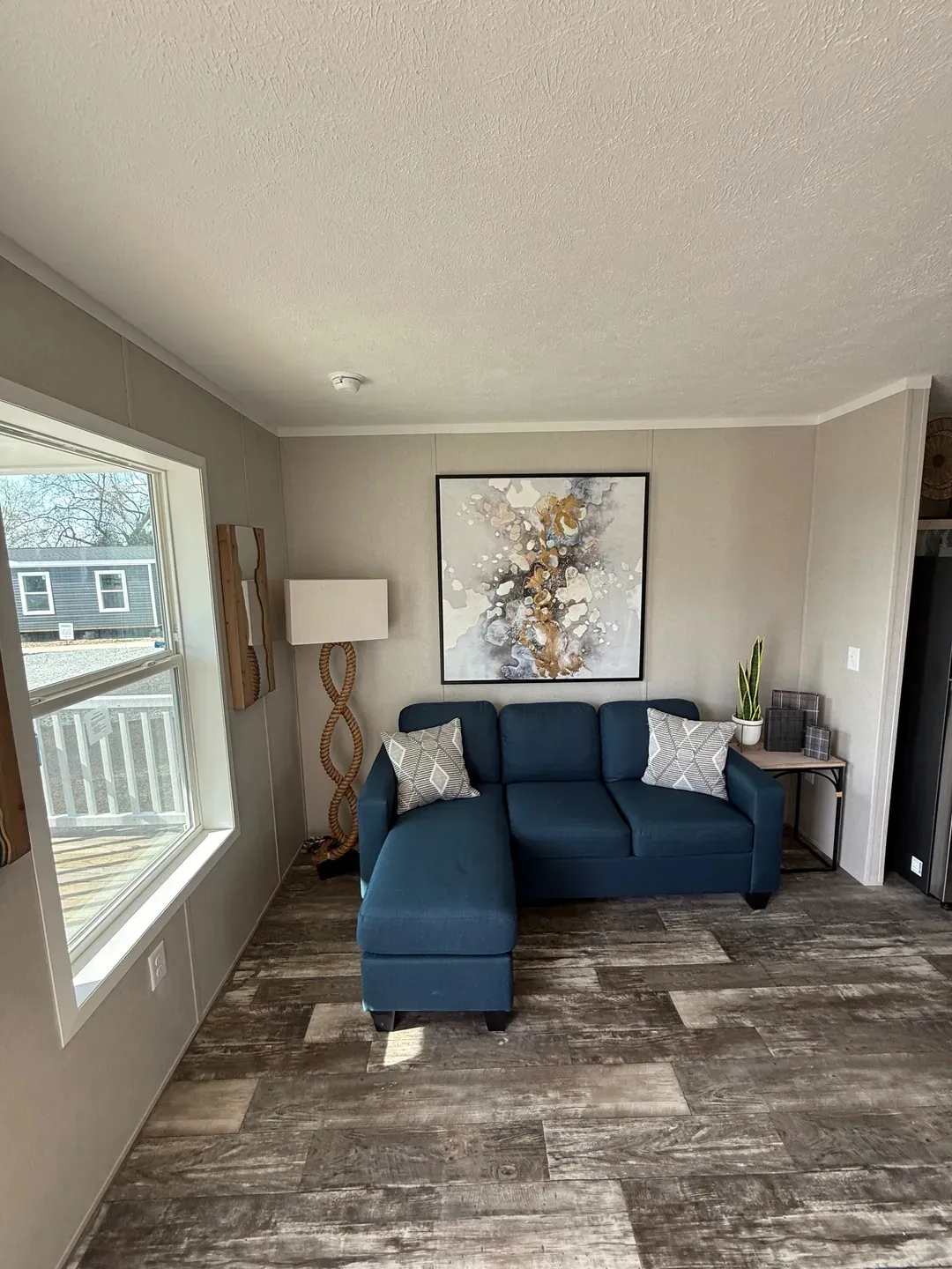 The ONYX Living Room. This Manufactured Mobile Home features 1 bedroom and 1 bath.