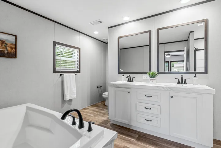 The THE ANNIVERSARY 2.1 Primary Bathroom. This Manufactured Mobile Home features 3 bedrooms and 2 baths.