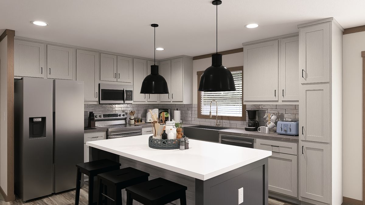 The SAWYER ELITE Kitchen. This Manufactured Mobile Home features 3 bedrooms and 2 baths.