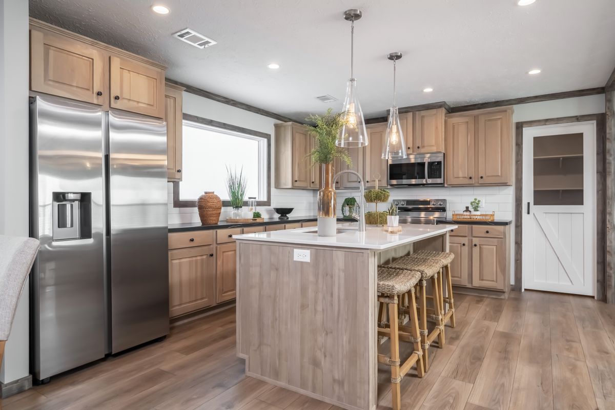 The THE JACKSON Kitchen. This Manufactured Mobile Home features 4 bedrooms and 2 baths.