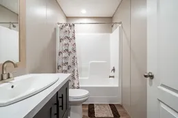 The BOONE Guest Bathroom. This Manufactured Mobile Home features 4 bedrooms and 2 baths.