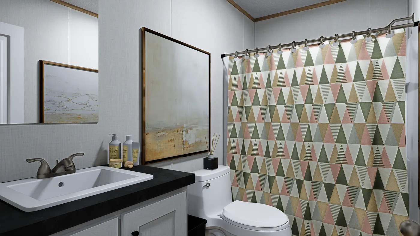 The ECLIPSE Guest Bathroom. This Manufactured Mobile Home features 4 bedrooms and 2 baths.