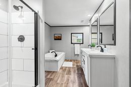 The THE ANNIVERSARY 2.1 Primary Bathroom. This Manufactured Mobile Home features 3 bedrooms and 2 baths.