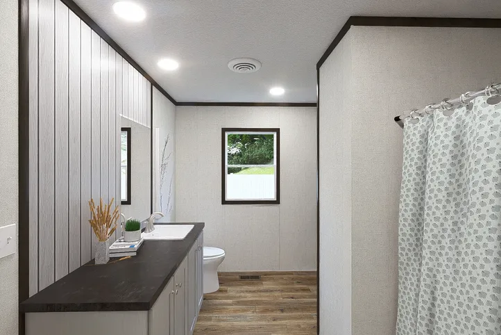 The BALANCE Primary Bathroom. This Manufactured Mobile Home features 3 bedrooms and 2 baths.