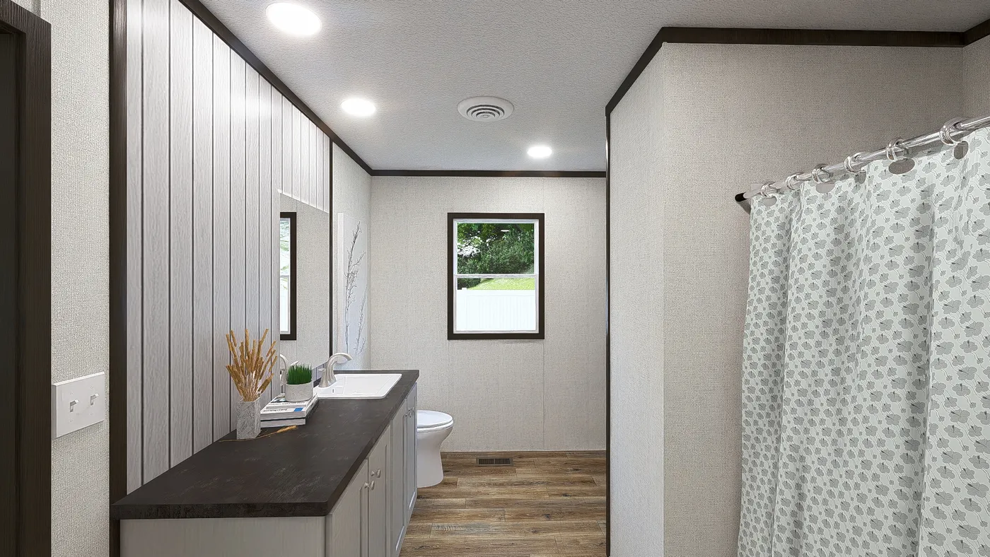 The BALANCE Primary Bathroom. This Manufactured Mobile Home features 3 bedrooms and 2 baths.