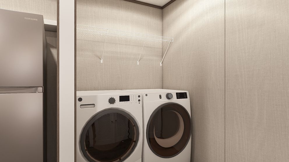 The LEGEND 14X66 Utility Room. This Manufactured Mobile Home features 3 bedrooms and 2 baths.