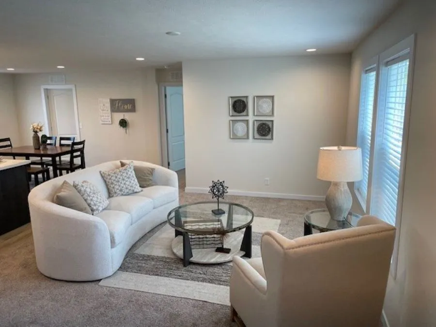 The SOMERSET DR/5228-MS012-1 SECT Living Room. This Manufactured Mobile Home features 3 bedrooms and 2 baths.