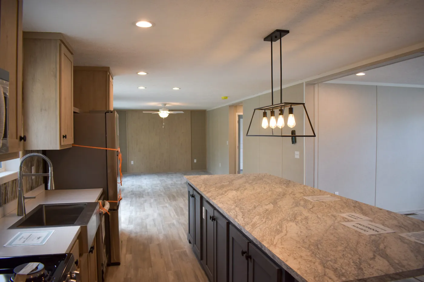 The MOONSTONE 60 Kitchen. This Manufactured Mobile Home features 3 bedrooms and 2 baths.