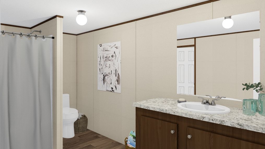 The THRILL Guest Bathroom. This Manufactured Mobile Home features 3 bedrooms and 2 baths.