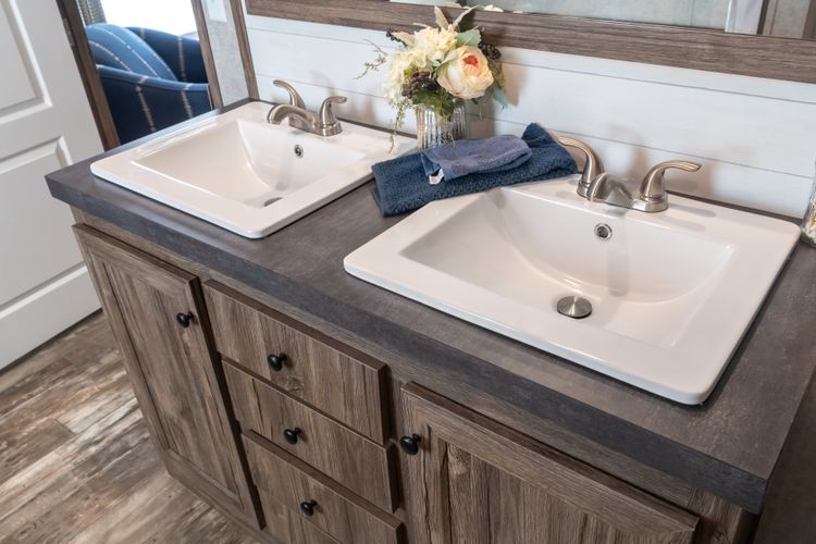 The LIBERTY Primary Bathroom. This Manufactured Mobile Home features 3 bedrooms and 2 baths.