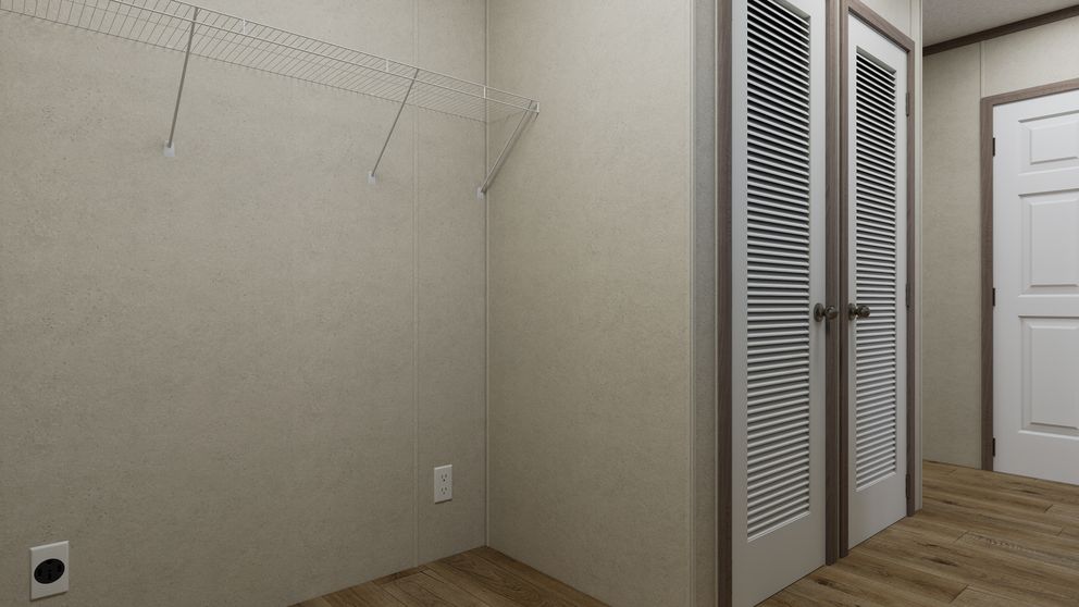 The 7216-CC01 CORNERSTONE 72 Utility Room. This Manufactured Mobile Home features 3 bedrooms and 2 baths.