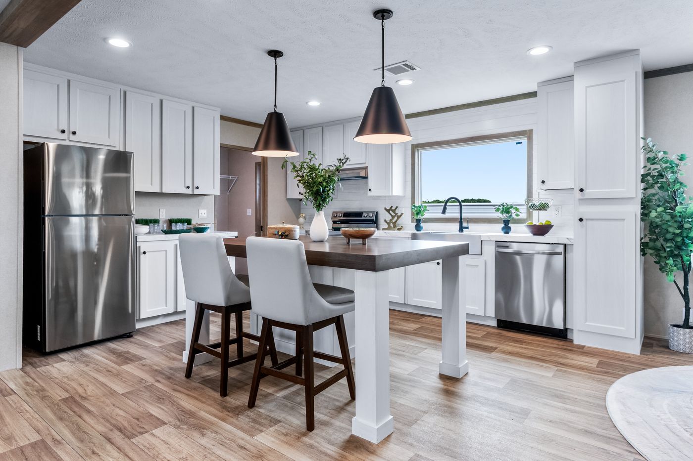 The THE CHOICE Kitchen. This Manufactured Mobile Home features 4 bedrooms and 2 baths.
