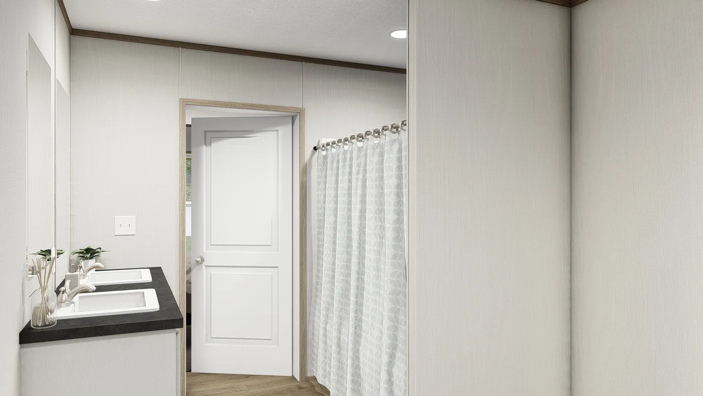 The VISTA 28X48 Primary Bathroom. This Manufactured Mobile Home features 3 bedrooms and 2 baths.