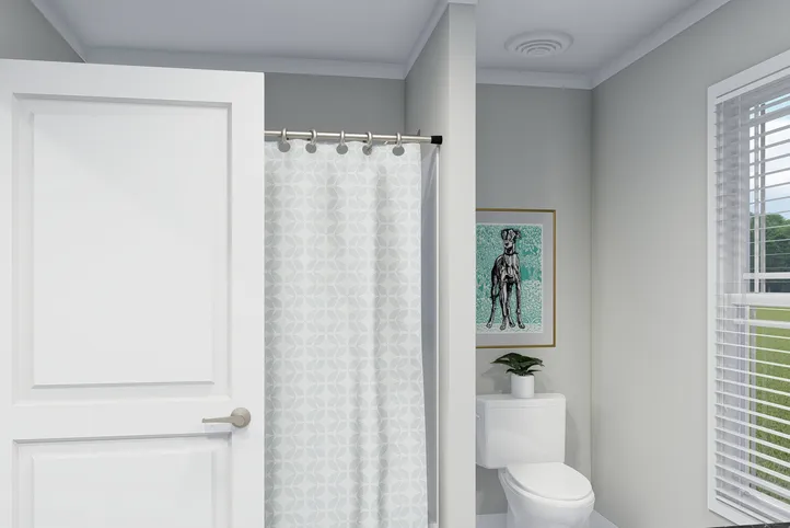 The THE BREEZE Guest Bathroom. This Manufactured Mobile Home features 3 bedrooms and 2 baths.