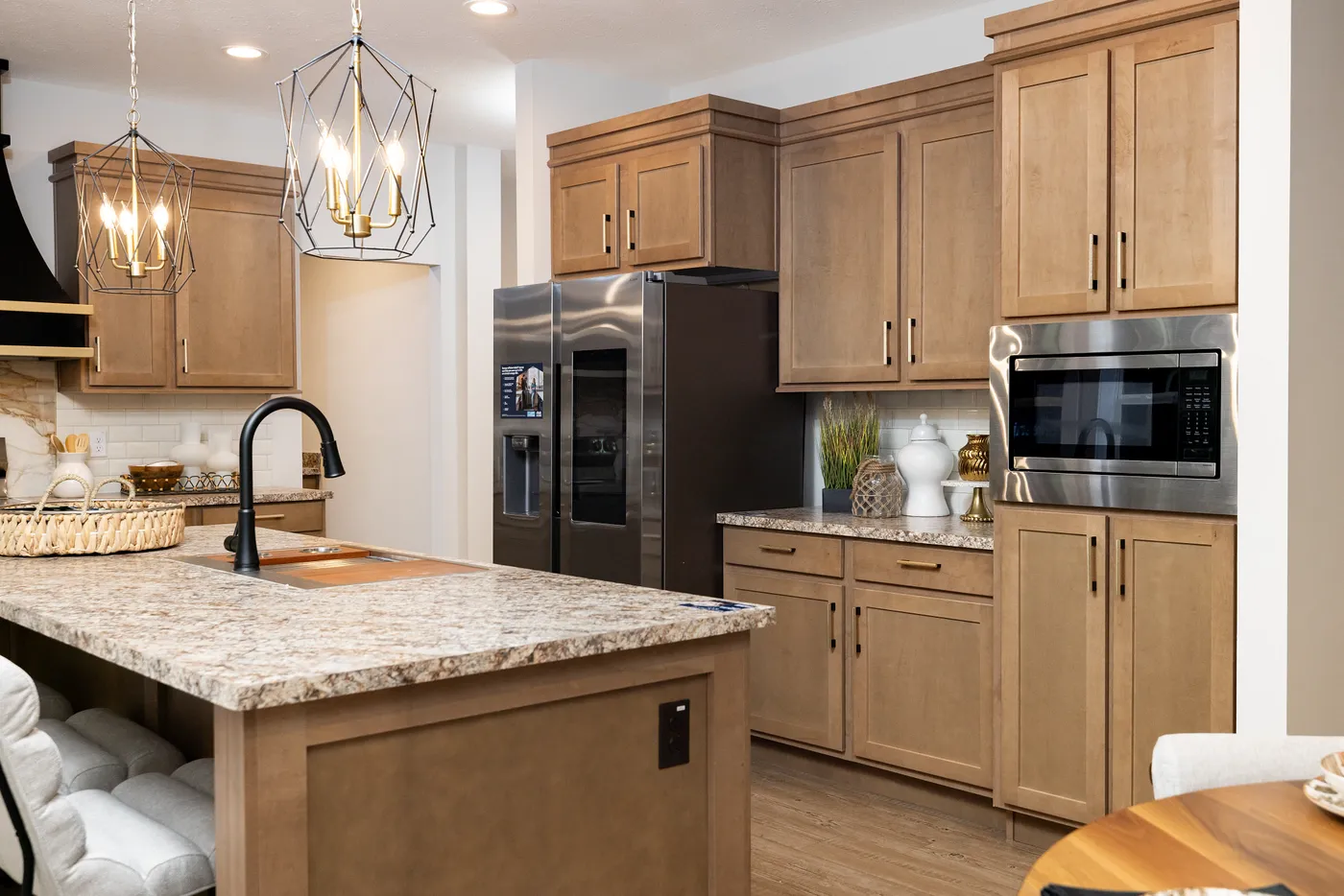 The MCCANN BLVD 6830-MS070 SECT Kitchen. This Manufactured Mobile Home features 3 bedrooms and 2 baths.