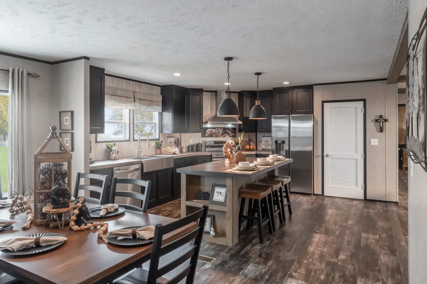 The THE TRIBUTARY Kitchen. This Manufactured Mobile Home features 3 bedrooms and 2 baths.