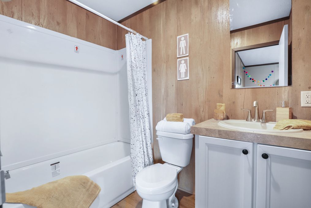 The BALANCE Guest Bathroom. This Manufactured Mobile Home features 3 bedrooms and 2 baths.