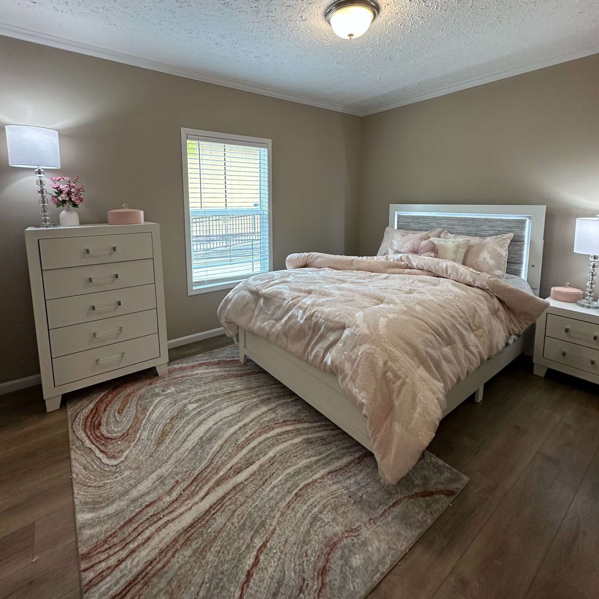 The THE HEXAGON Primary Bedroom. This Manufactured Mobile Home features 4 bedrooms and 3 baths.