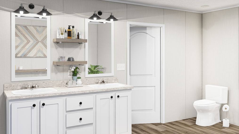 The THE FUSION 32H Primary Bathroom. This Manufactured Mobile Home features 5 bedrooms and 3 baths.