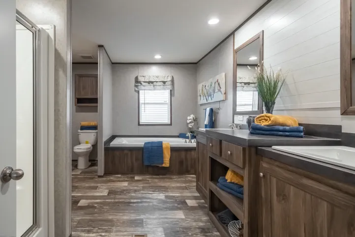 The LOCKLEAR Exterior. This Manufactured Mobile Home features 4 bedrooms and 2 baths.