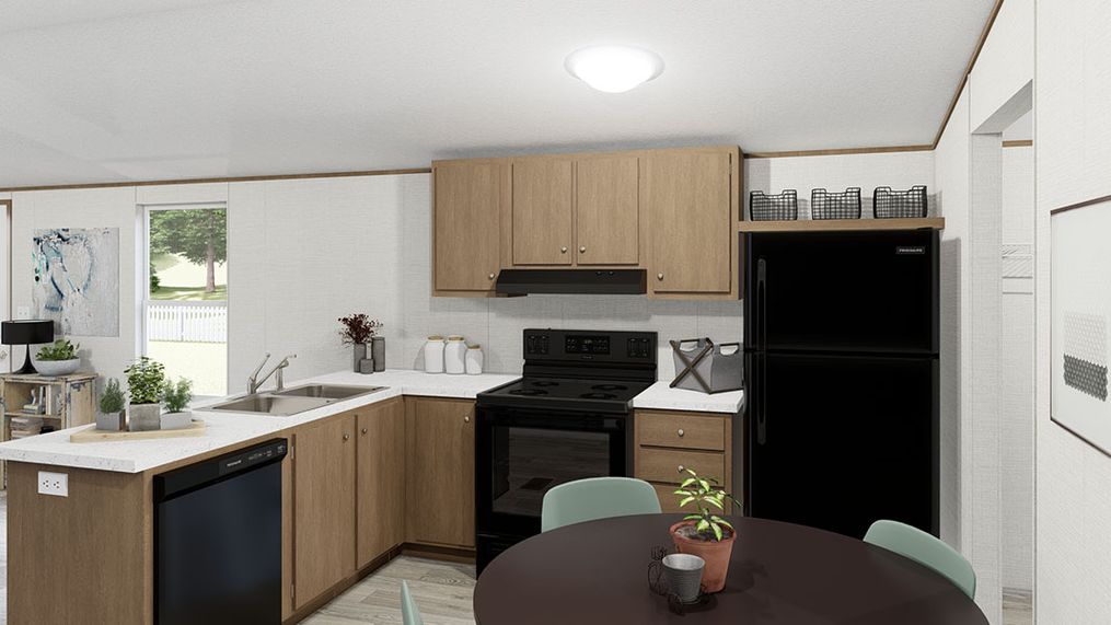 The DELIGHT Kitchen. This Manufactured Mobile Home features 2 bedrooms and 2 baths.