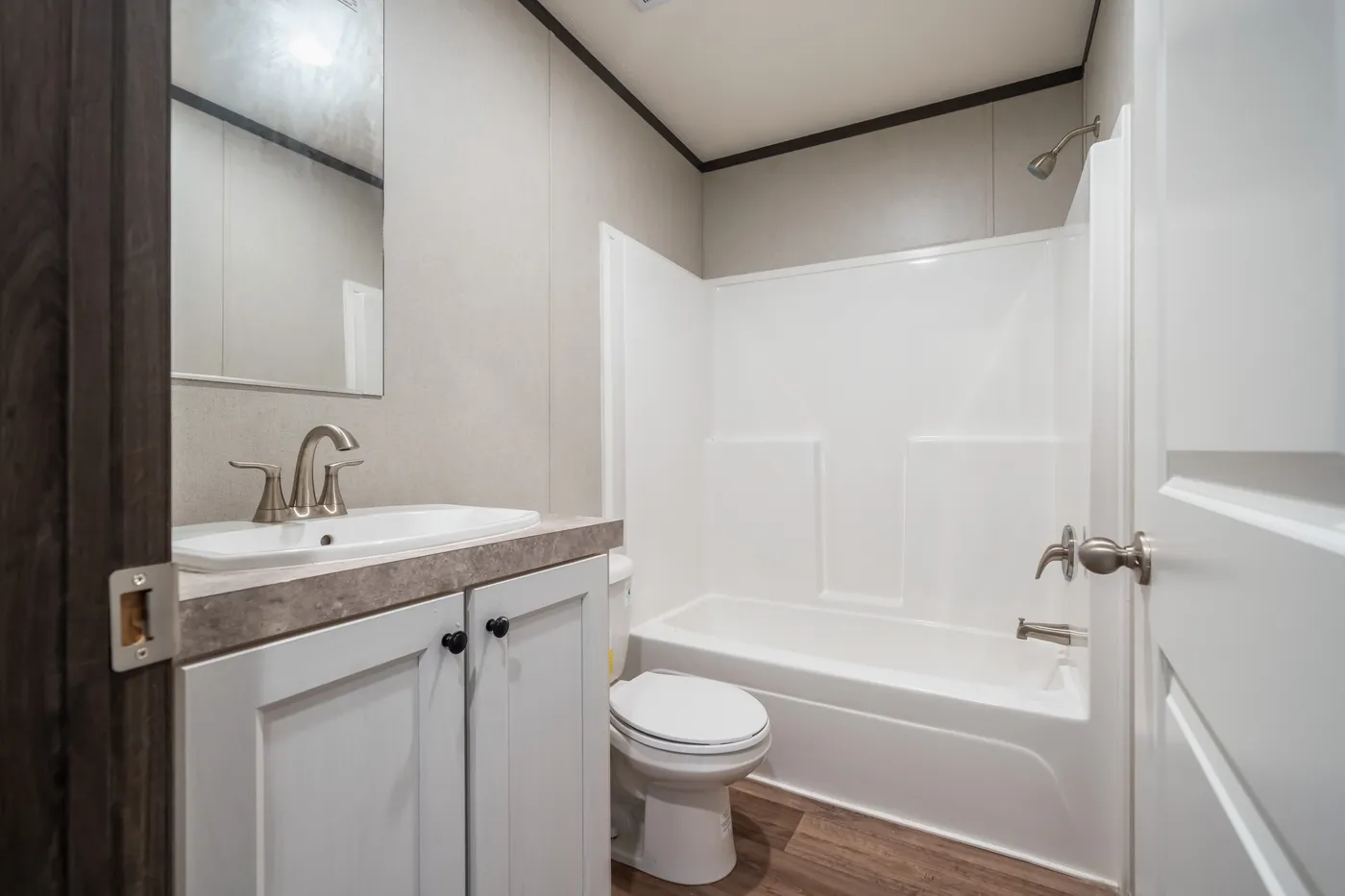 The ESSENCE Guest Bathroom. This Manufactured Mobile Home features 3 bedrooms and 2 baths.
