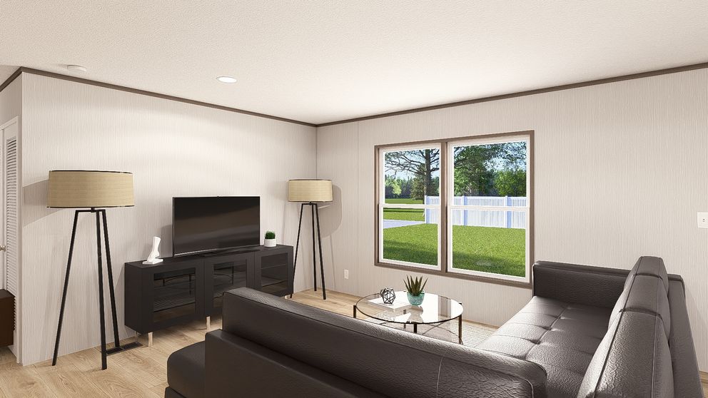 The LEGEND 16X72 COASTAL BREEZE I Living Room. This Manufactured Mobile Home features 3 bedrooms and 2 baths.