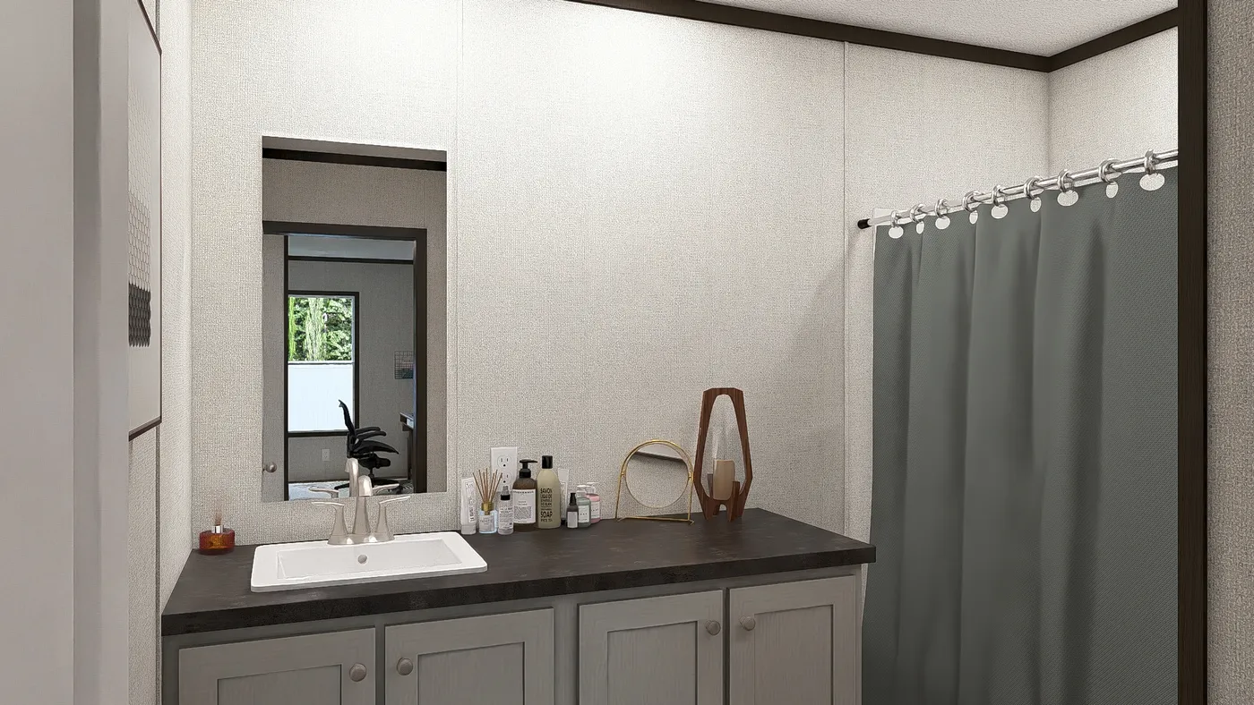 The AMBITION Guest Bathroom. This Manufactured Mobile Home features 4 bedrooms and 2 baths.