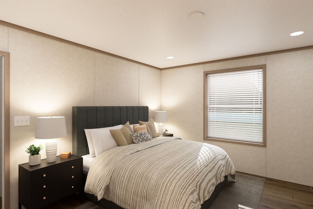 The 7616-CC01 CORNERSTONE 76 Primary Bedroom. This Manufactured Mobile Home features 3 bedrooms and 2 baths.