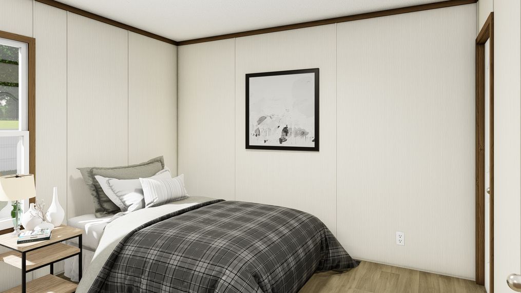 The BALANCE Bedroom. This Manufactured Mobile Home features 3 bedrooms and 2 baths.
