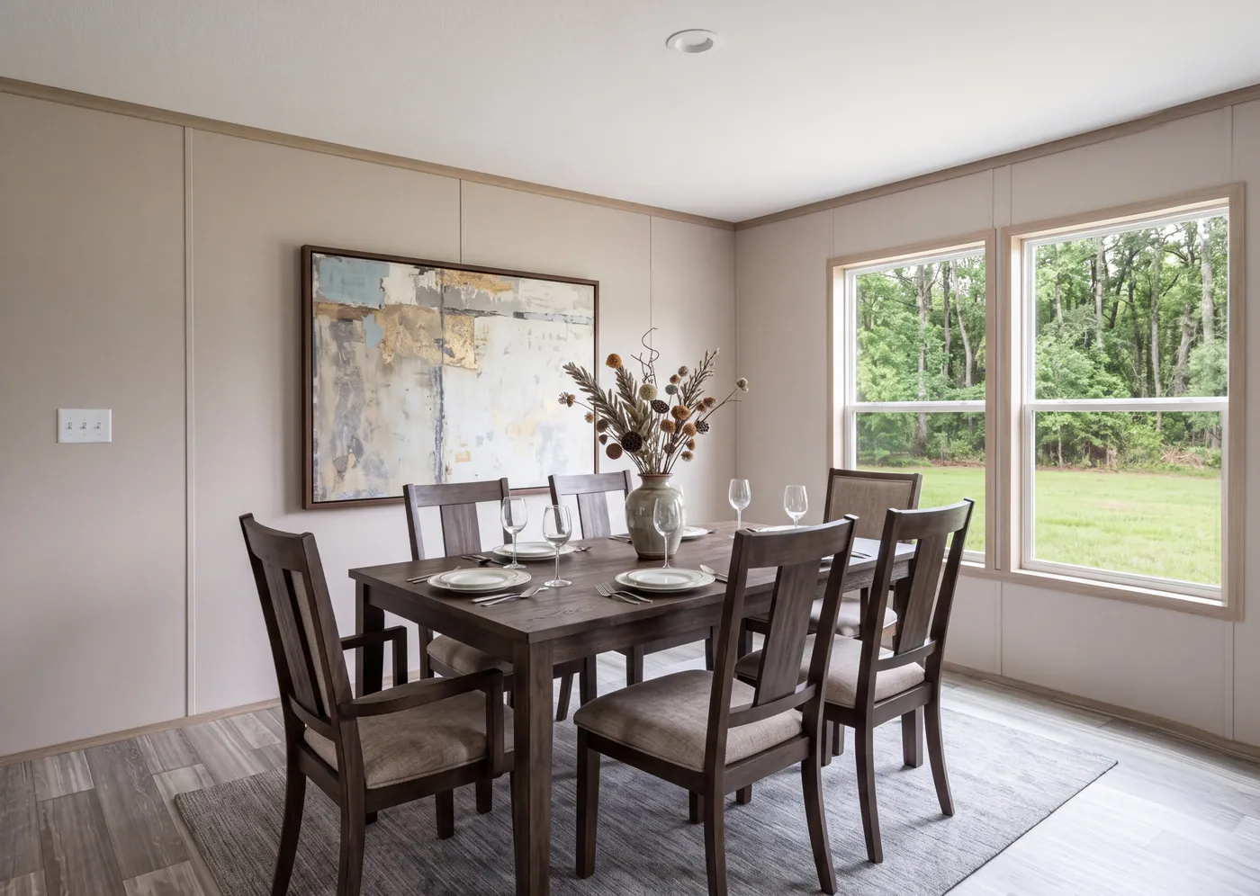 The THE MOUNTAINEER 76 Dining Area. This Manufactured Mobile Home features 4 bedrooms and 2 baths.