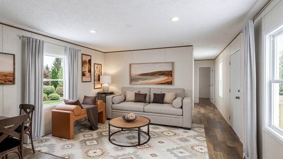 The ASPEN Living Room. This Manufactured Mobile Home features 3 bedrooms and 2 baths.
