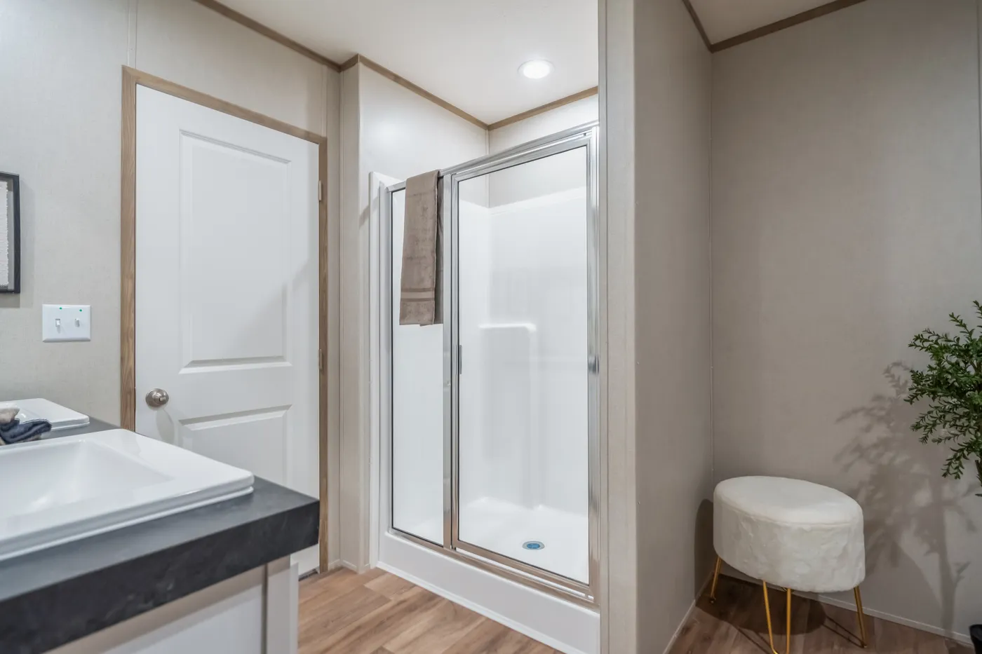 The ECLIPSE Primary Bathroom. This Manufactured Mobile Home features 4 bedrooms and 2 baths.