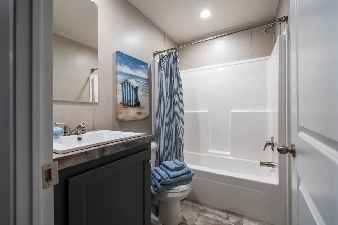 The ANNIVERSARY CHOICE Exterior. This Manufactured Mobile Home features 3 bedrooms and 2 baths.
