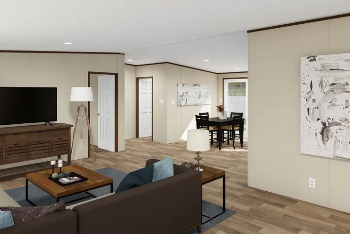 The SATISFACTION Living Room. This Manufactured Mobile Home features 3 bedrooms and 2 baths.