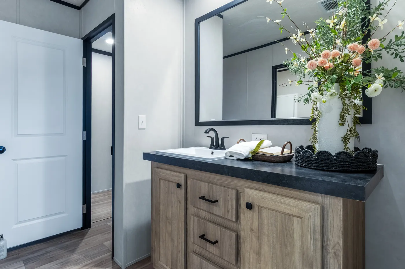 The ODYSSEY Guest Bathroom. This Manufactured Mobile Home features 4 bedrooms and 2 baths.