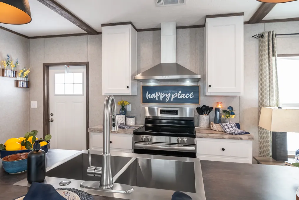 The LIBERTY Kitchen. This Manufactured Mobile Home features 3 bedrooms and 2 baths.