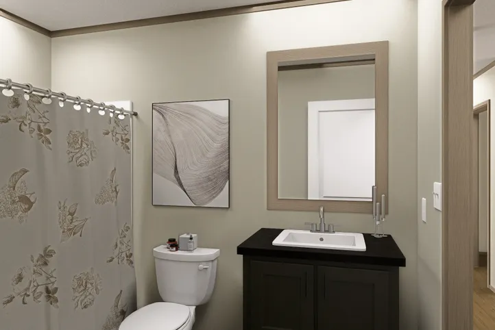 The RAINIER Guest Bathroom. This Manufactured Mobile Home features 4 bedrooms and 3 baths.