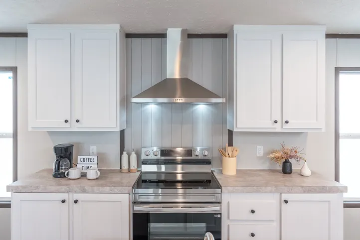 The EMPOWER Kitchen. This Manufactured Mobile Home features 4 bedrooms and 2 baths.